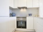 Modern new apartment in Cala D'or, 88m², 2 bedrooms, 2 bathrooms, terrace, community pool, air conditioning - B6-Compass-Cala dOr-kitchen-Oct2022