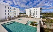 Appartement moderne de construction récente à Cala D'or, 88m², 2 chambres, 2 salles de bain, terrasse, piscine communautaire, climatisation - Anlage