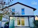 Quiet detached house in top residential area, KfW 70, 145 sqm, 4 bedrooms, 2 bathrooms, cellar, conservatory, heat pump, garden - Ansicht Wintergarten