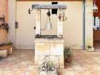 Idyllic finca in Ses Salines: 327 m², 2 bedrooms, 2 bathrooms, pool, terraces, outdoor kitchen, garage, solar energy - Brunnen
