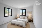 Exclusiva villa de nueva construcción en Cala Llombards con 3 dormitorios, 3 baños, piscina, vistas al mar, aire acondicionado y calefacción por suelo radiante. - Schlafzimmer