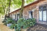 LOFT im luxuriös sanierten Gutshof, 165 qm, 4 SZ, Bad, WC, Einbauküche, Garten&Terrassen, Tiefgarage - Gartenansicht