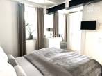 Loft apartment in luxuriously restored manor house, 134 sqm, 2 bedrooms, bathroom, garden & terraces, cellar, garage - Schlafen 1